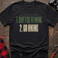 Black cotton t-shirt with How to Avoid Stress at Work Don’t Go to Work Go Hiking text on rustic woo