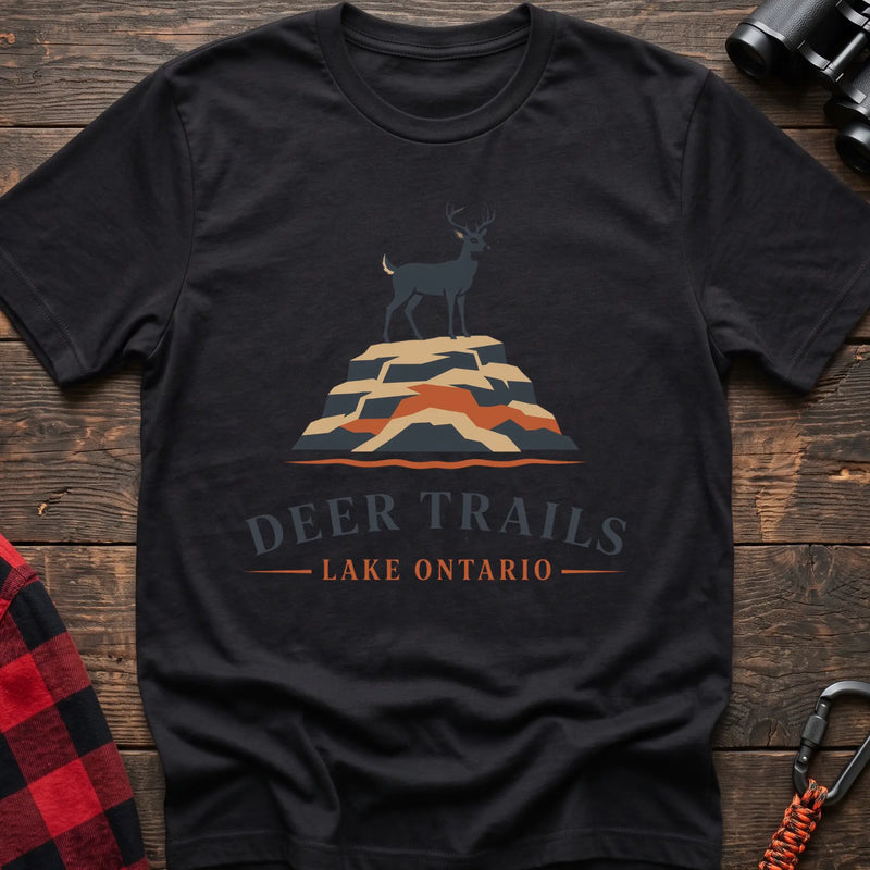 Black hiking t-shirt with a deer on a rocky bluff and the text “Deer Trails Lake Ontario”