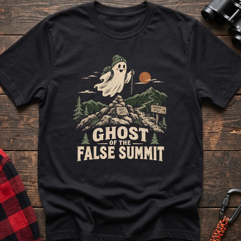 Black cotton t-shirt with a hiking ghost graphic and Ghost of the False Summit text on rustic wood