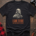 Black cotton t-shirt with a Viking graphic and I Came to Hike I May Have Raided the Snacks text on rustic wood