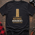 Black cotton t-shirt with a granola bar graphic and National Monument This Granola Bar text on rustic wood