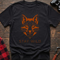 Black t-shirt with geometric orange fox head graphic and the text Stay Wild