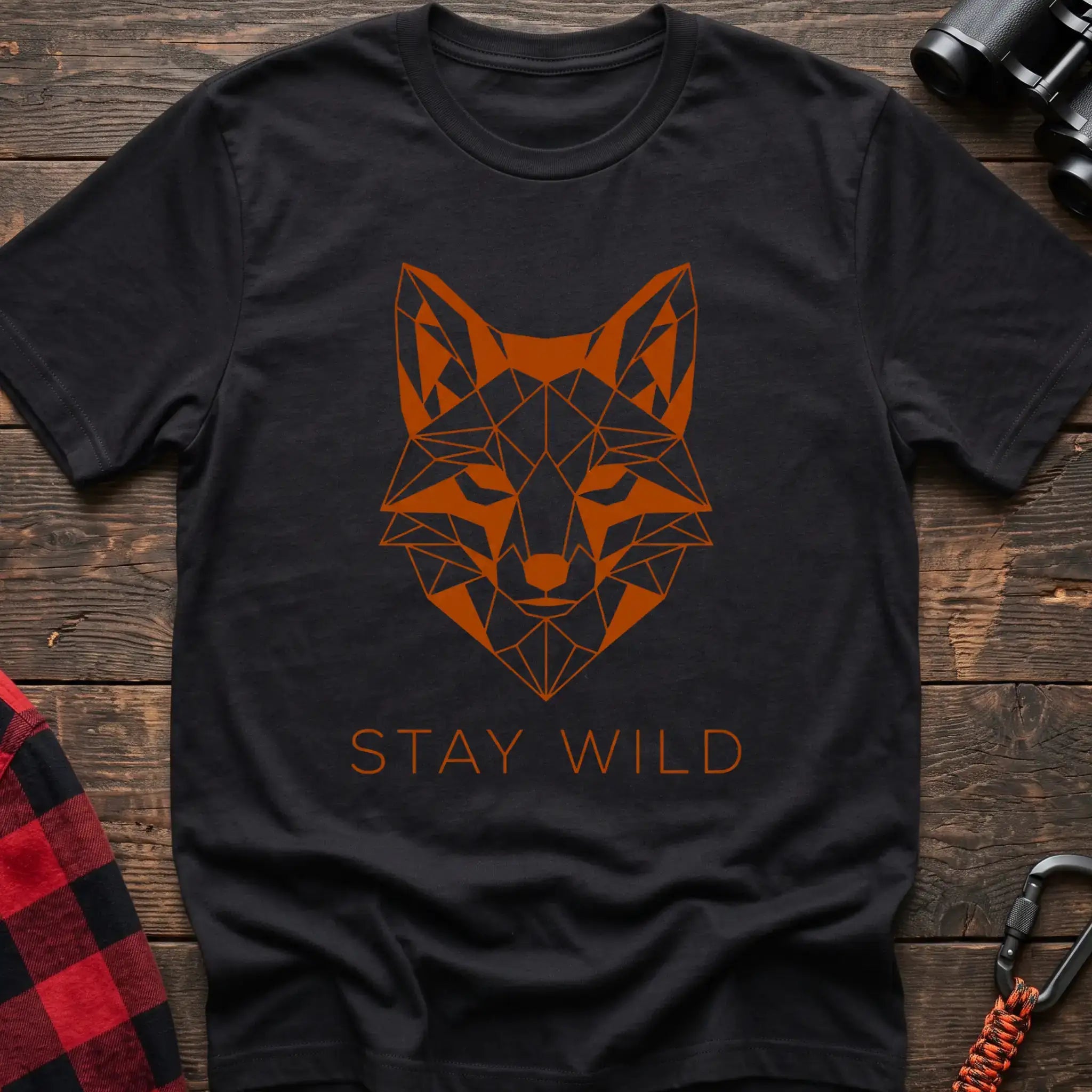Black t-shirt with geometric orange fox head graphic and the text Stay Wild