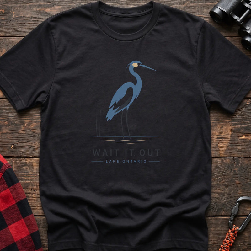 Black hiking t-shirt with a blue heron graphic and the text “Wait It Out Lake Ontario”
