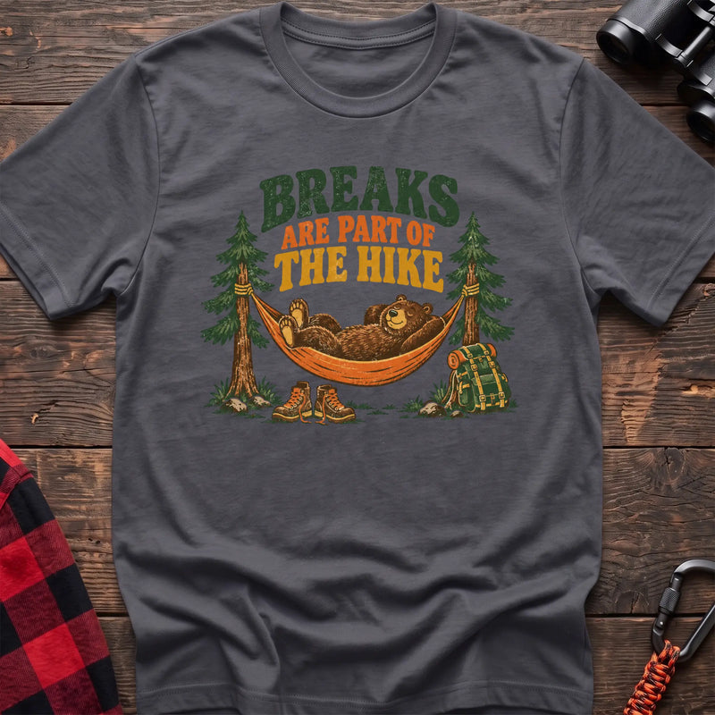 Charcoal cotton t-shirt with a bear in a hammock graphic and Breaks Are Part of the Hike text on rustic wood
