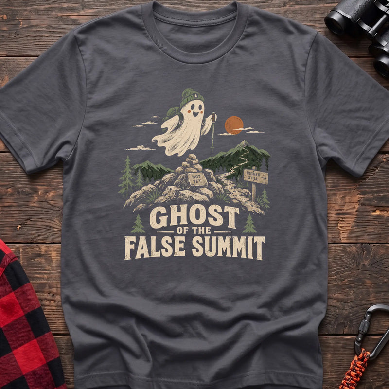 Charcoal cotton t-shirt with a hiking ghost graphic and Ghost of the False Summit text on rustic wood