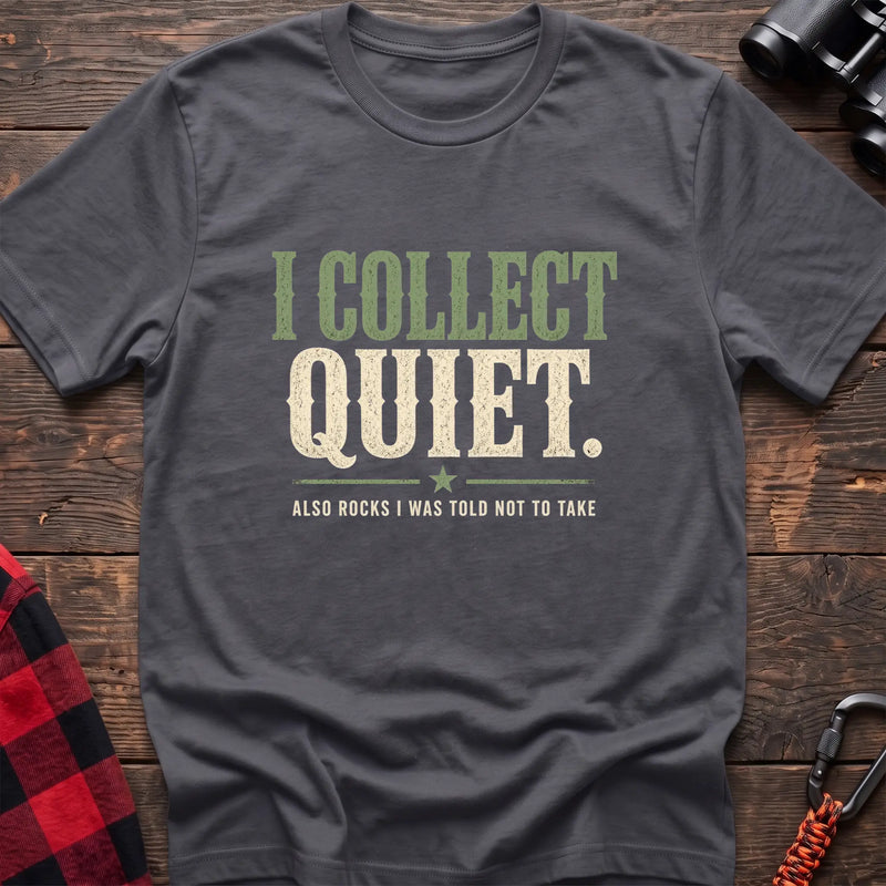 Charcoal cotton t-shirt with I Collect Quiet Also Rocks I Was Told Not to Take text on rustic wood