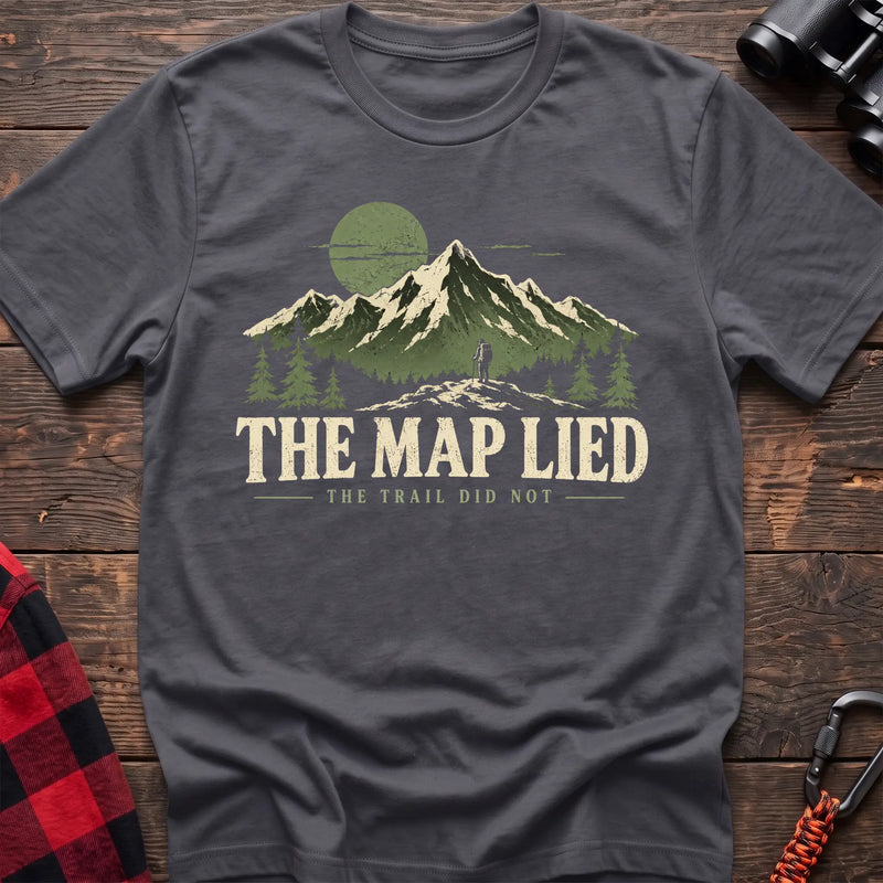 Charcoal cotton t-shirt with a hiker and mountain graphic and The Map Lied The Trail Did Not text on rustic wood