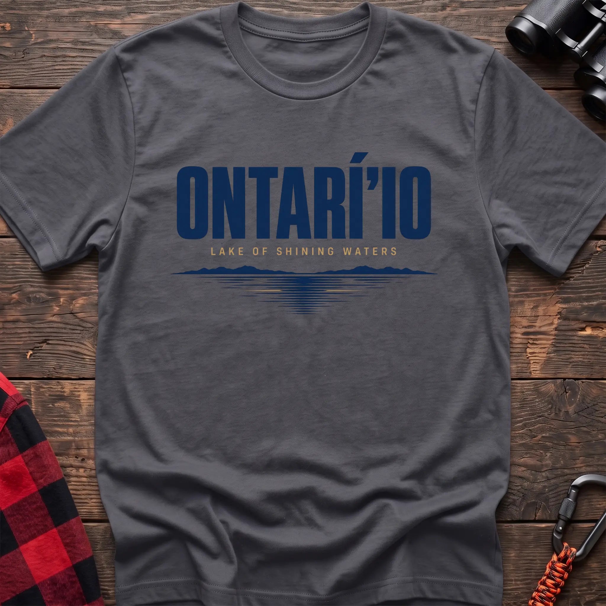 Charcoal cotton hiking t-shirt with Ontarí'io Lake of Shining Waters text and stylized lake reflection graphic
