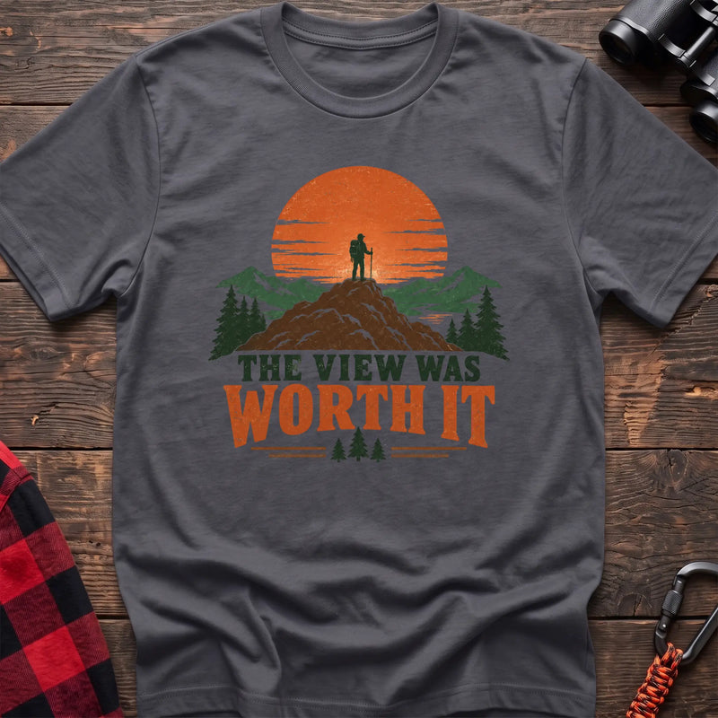 Charcoal cotton t-shirt with a hiker on a mountain sunset graphic and The View Was Worth It text on rustic wood