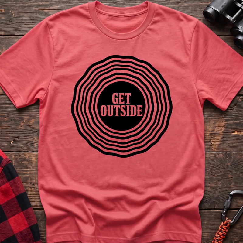 Coral silk hiking t-shirt with Get Outside text inside a black topographic ripple circle graphic