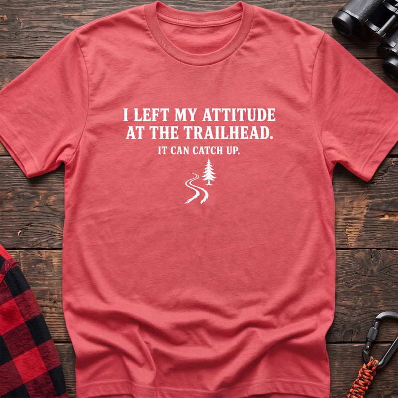 Coral silk cotton t-shirt with a trail graphic and I Left My Attitude at the Trailhead It Can Catch Up text on rustic wood