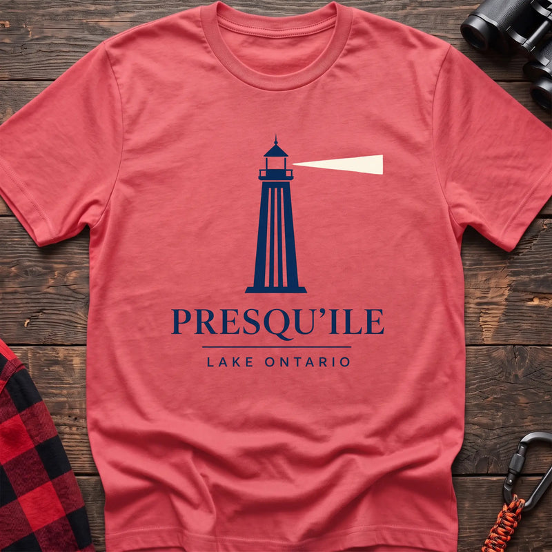 Coral silk cotton t-shirt with a navy lighthouse graphic and the text “Presqu’ile Lake Ontario”