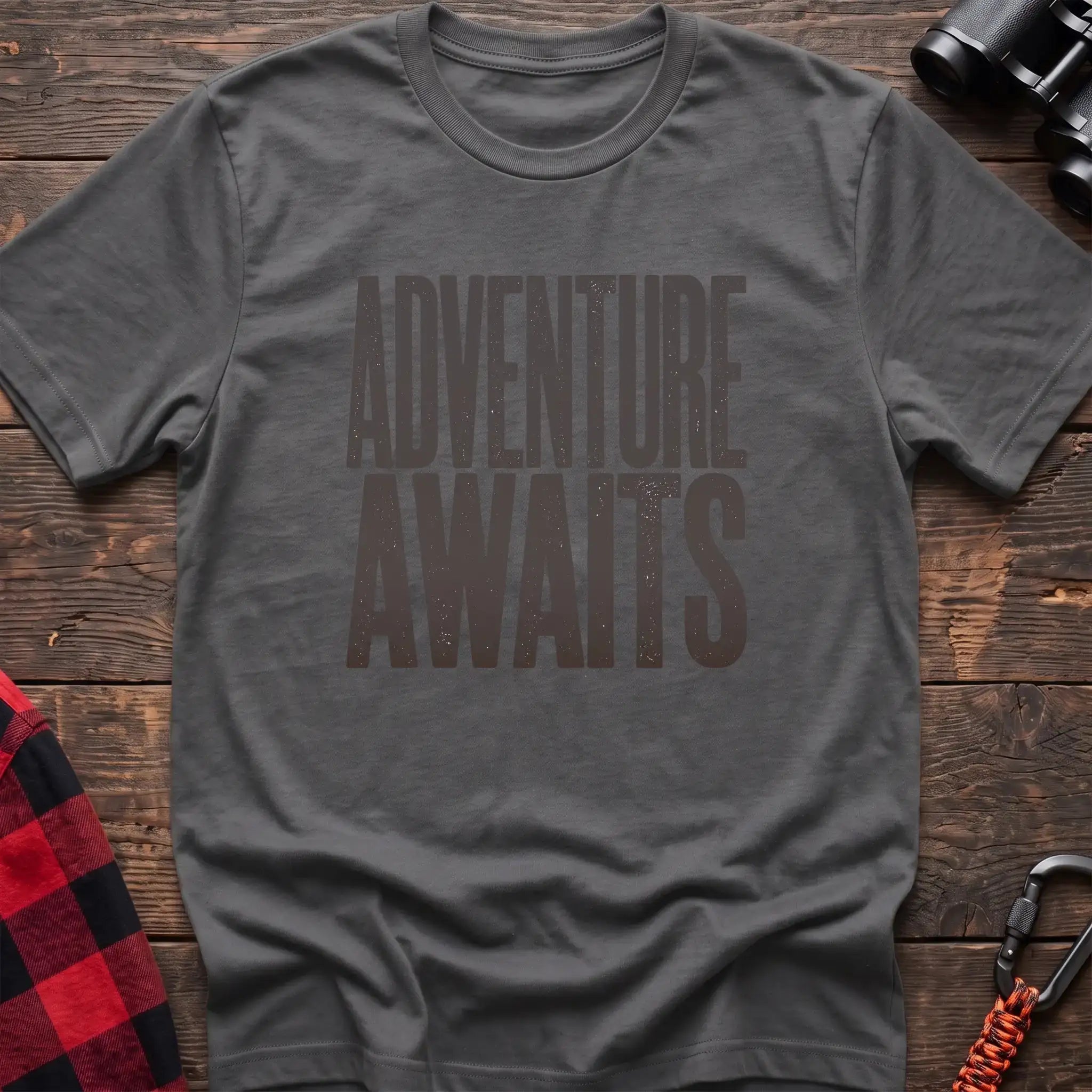Graphite heather t-shirt with large distressed gray text reading Adventure Awaits