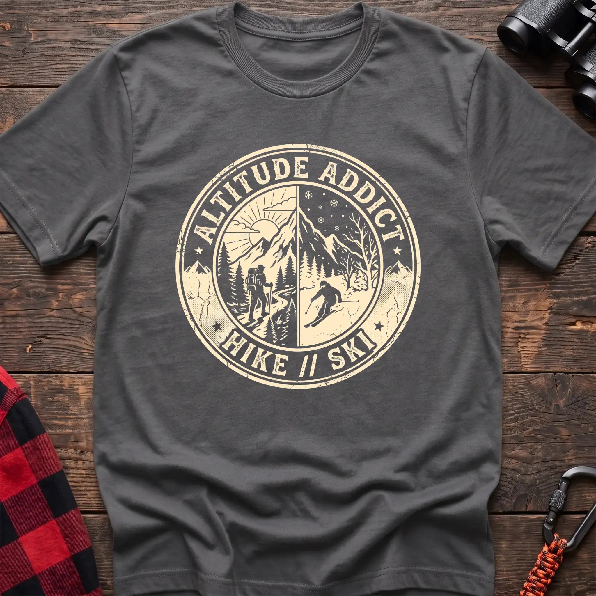 Graphite heather t-shirt with circular badge graphic of a hiker and skier on split mountain scenes, reading Altitude Addict Hike Ski