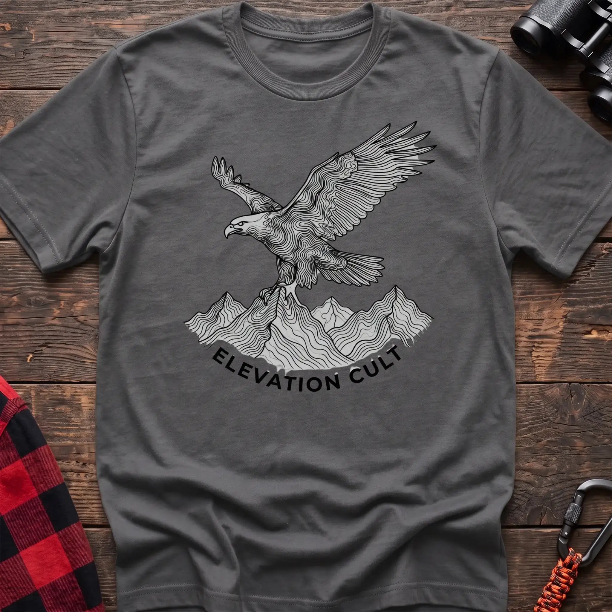 Graphite heather t-shirt with detailed eagle perched on mountains graphic and the text Elevation Cult