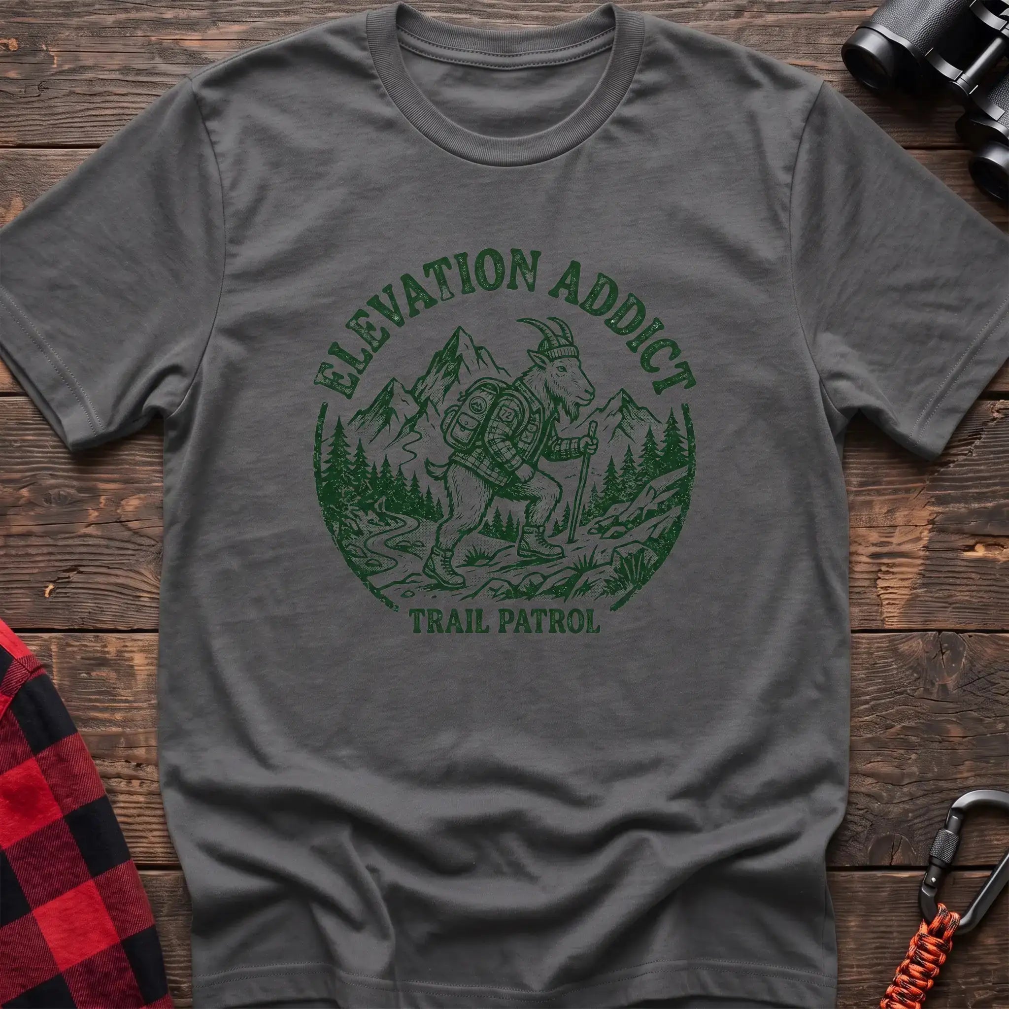 Graphite heather t-shirt with circular graphic of a hiking mountain goat and the text Elevation Addict Trail Patrol