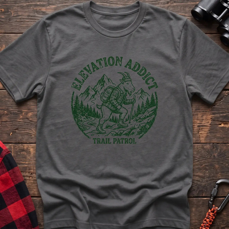 Graphite heather t-shirt with circular graphic of a hiking mountain goat and the text Elevation Addict Trail Patrol