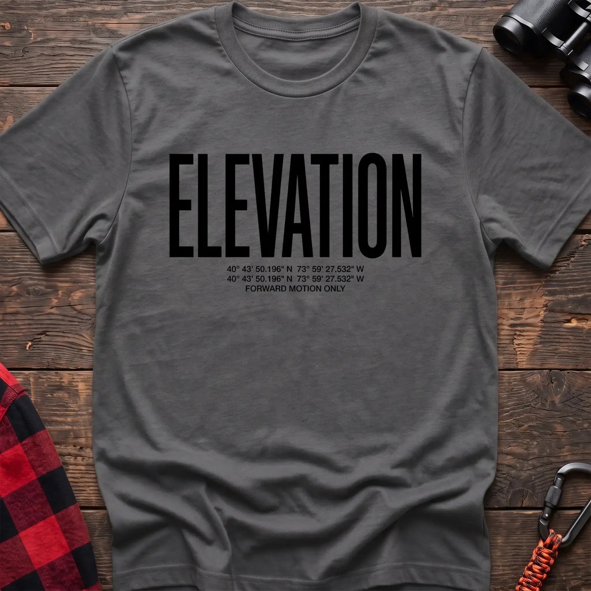 Graphite heather t-shirt with large black text reading Elevation and GPS coordinates with Forward Motion Only