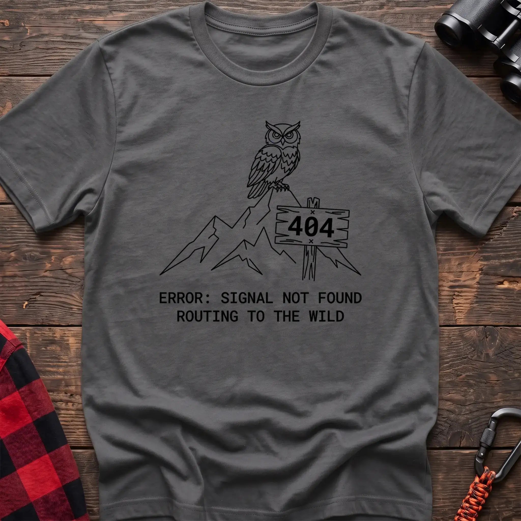 Graphite heather t-shirt with owl on a mountain peak next to a 404 sign and the text Error Signal Not Found Routing to the Wild