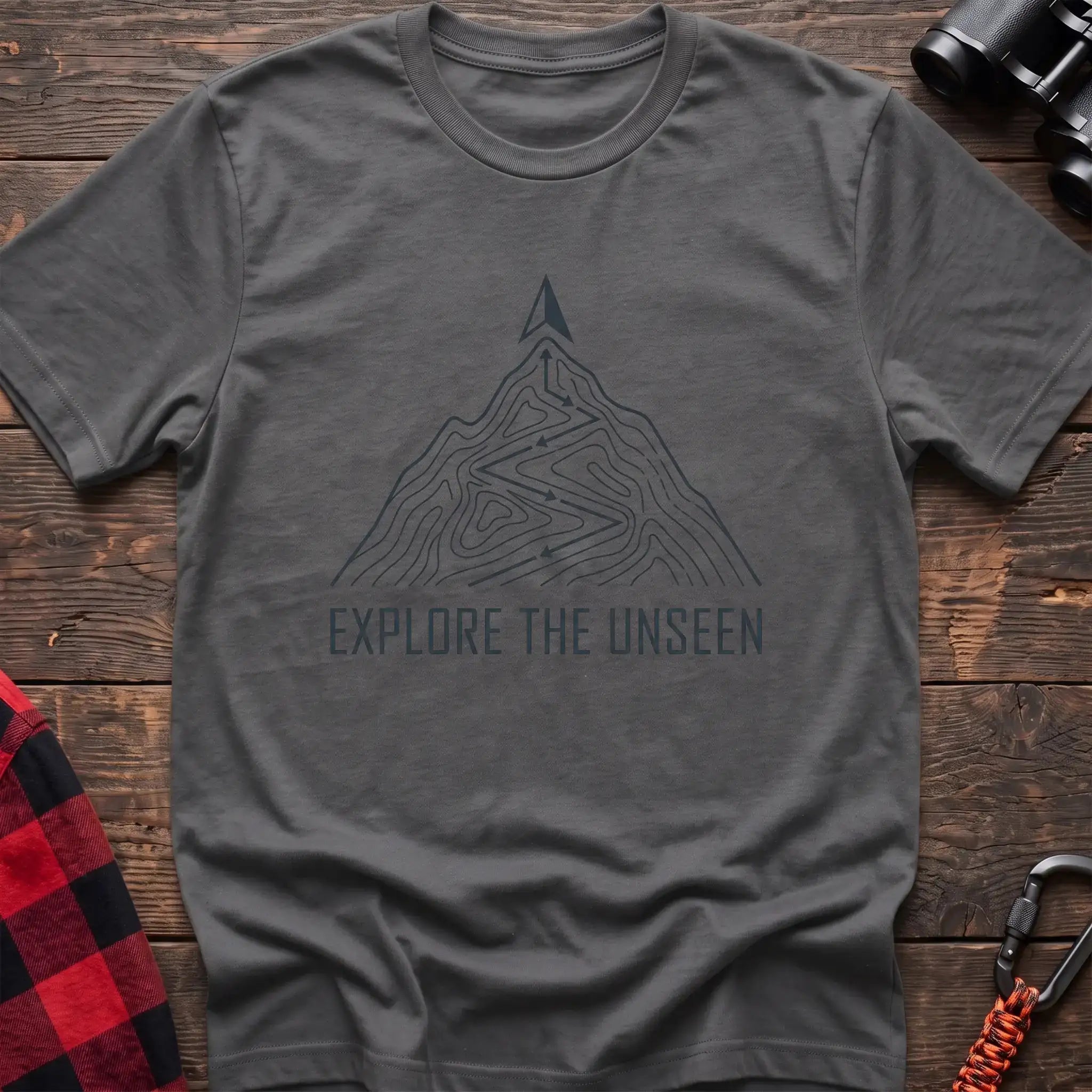 Graphite heather t-shirt with topographic mountain trail graphic and the text Explore the Unseen