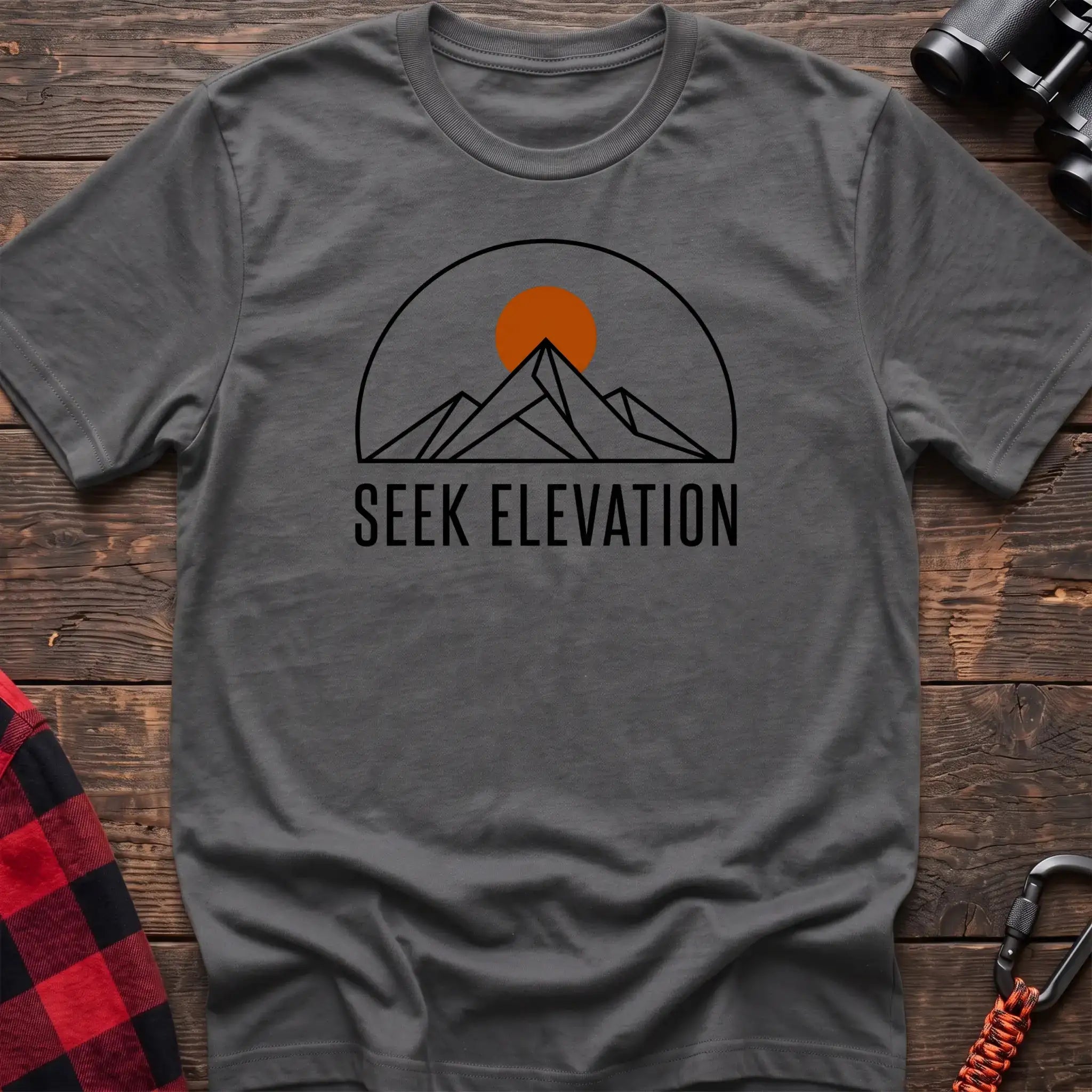 Graphite heather t-shirt with minimalist mountain and sun graphic reading Seek Elevation