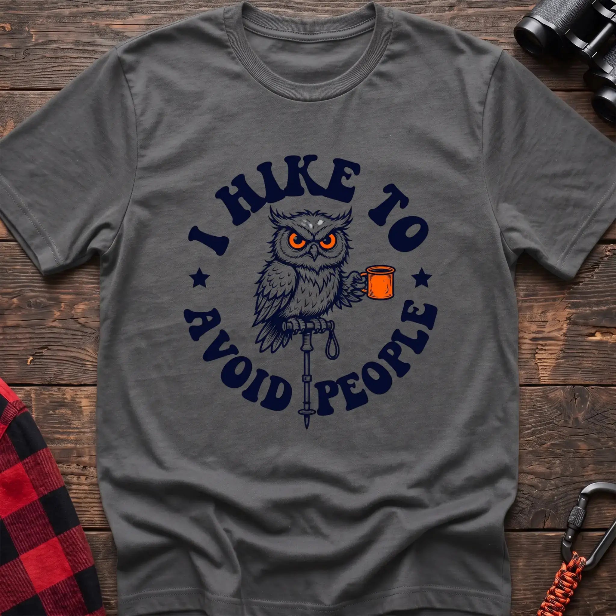 Graphite heather t-shirt with owl holding a camping mug on a hiking pole and the text I Hike to Avoid People