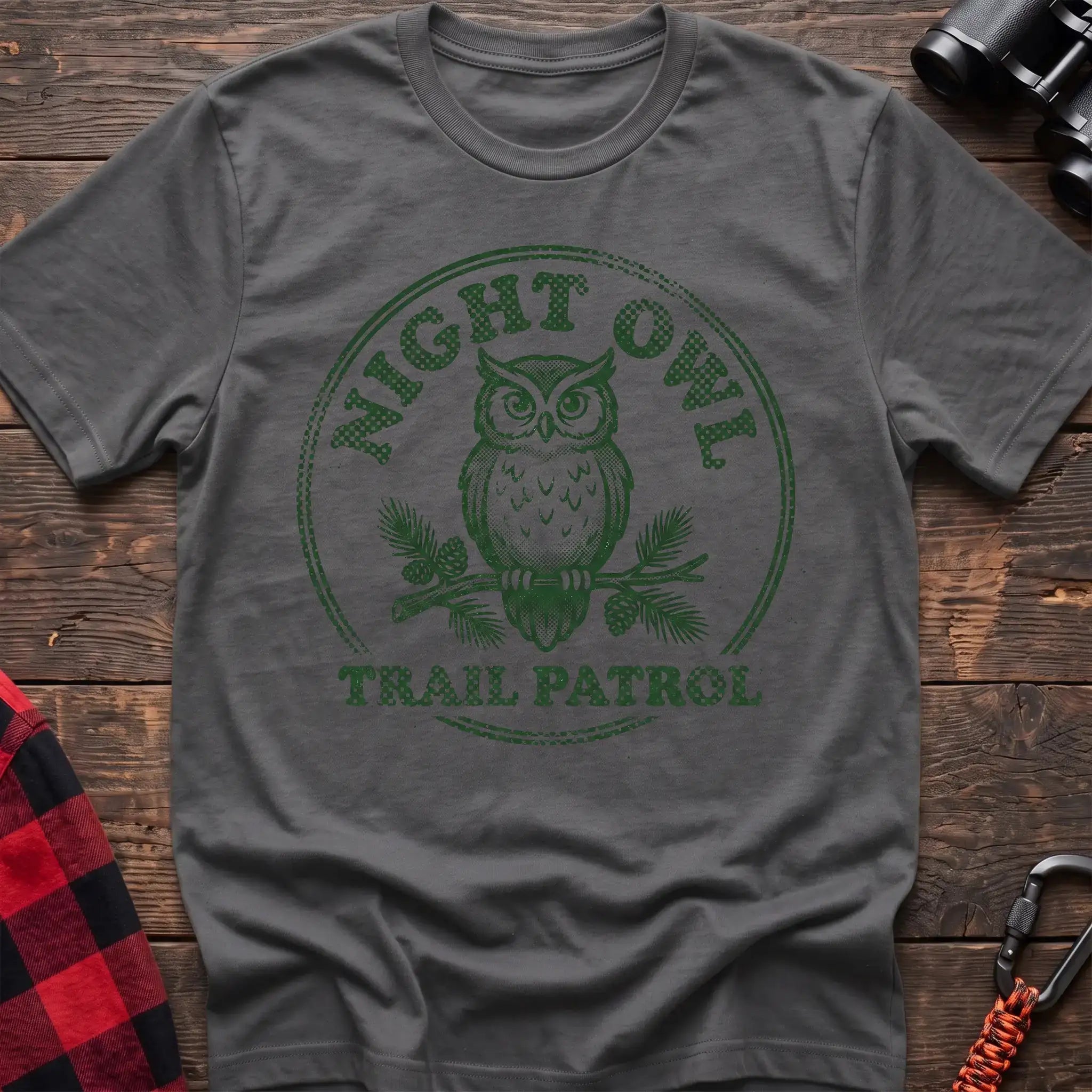 Graphite heather t-shirt with green owl on a pine branch graphic and the text Night Owl Trail Patrol