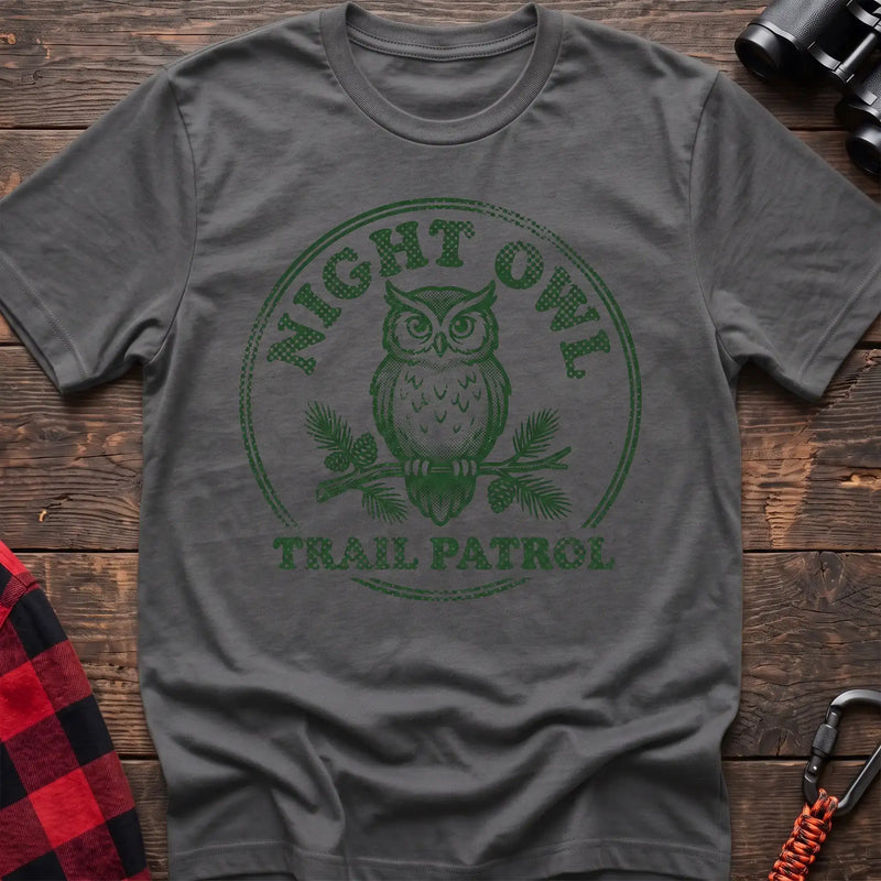 Graphite heather t-shirt with green owl on a pine branch graphic and the text Night Owl Trail Patrol