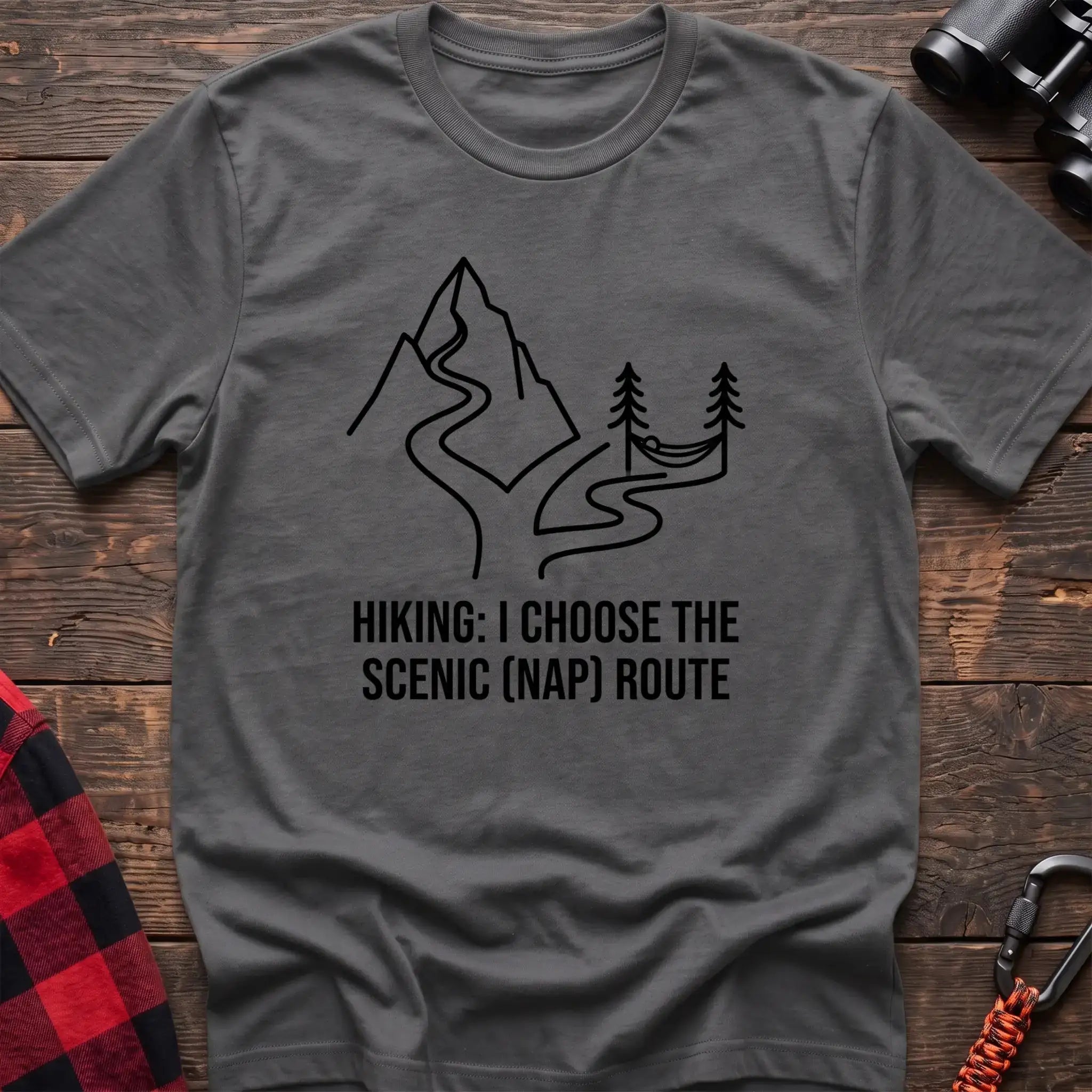 Graphite heather t-shirt with minimalist mountain trail and hammock graphic reading Hiking I Choose the Scenic Nap Route