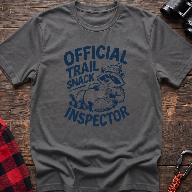 Graphite heather t-shirt with cartoon raccoon holding a snack and the text Official Trail Snack Inspector