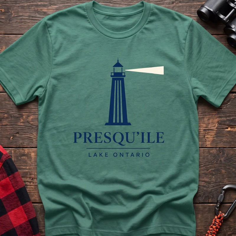 Heather Irish green cotton t-shirt with a navy lighthouse graphic and the text “Presqu’ile Lake Ontario”