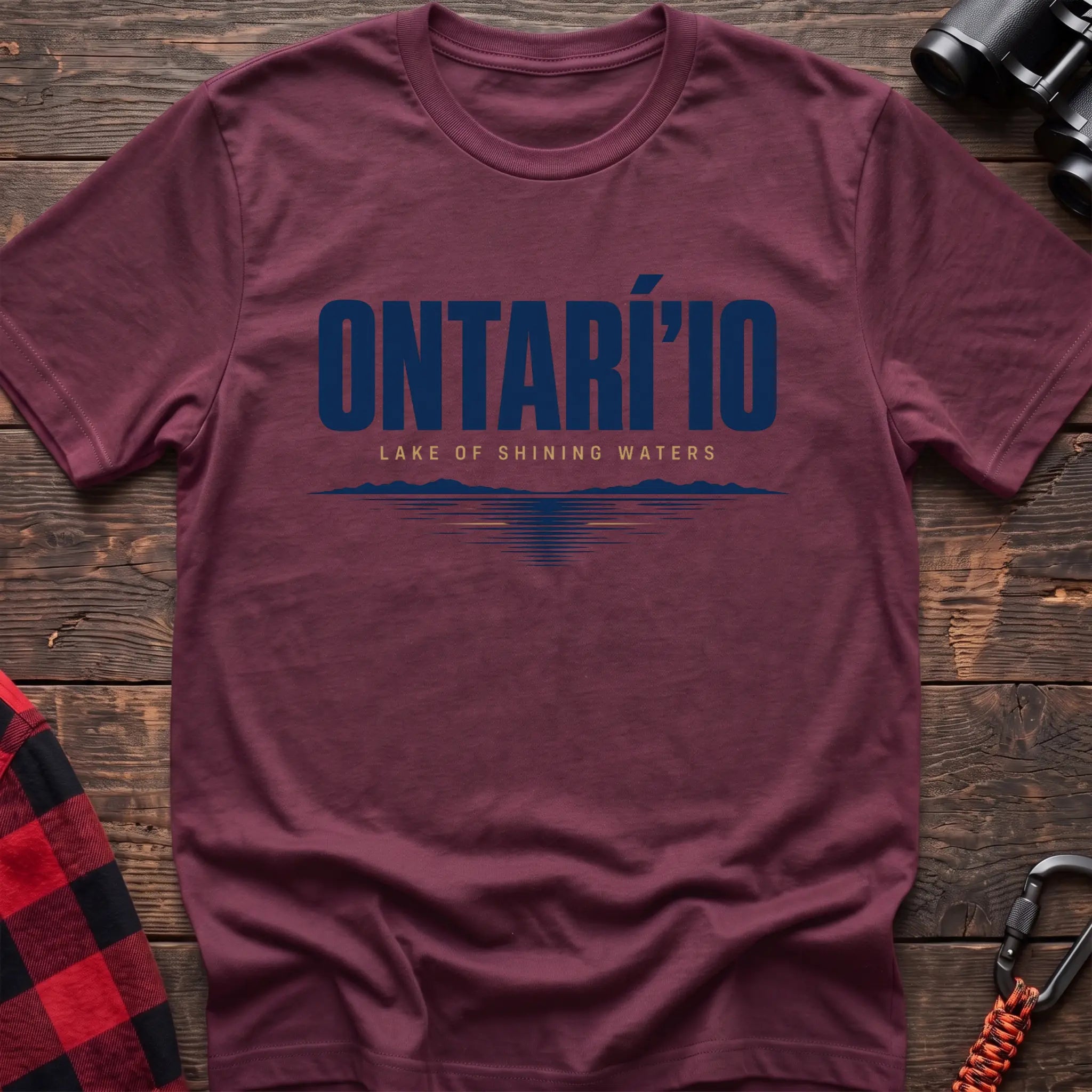 Heather maroon cotton hiking t-shirt with Ontarí'io Lake of Shining Waters text and stylized lake reflection graphic