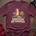 Heather maroon cotton t-shirt with a backpack chipmunk graphic and Somewhat Outdoorsy text on rustic wood