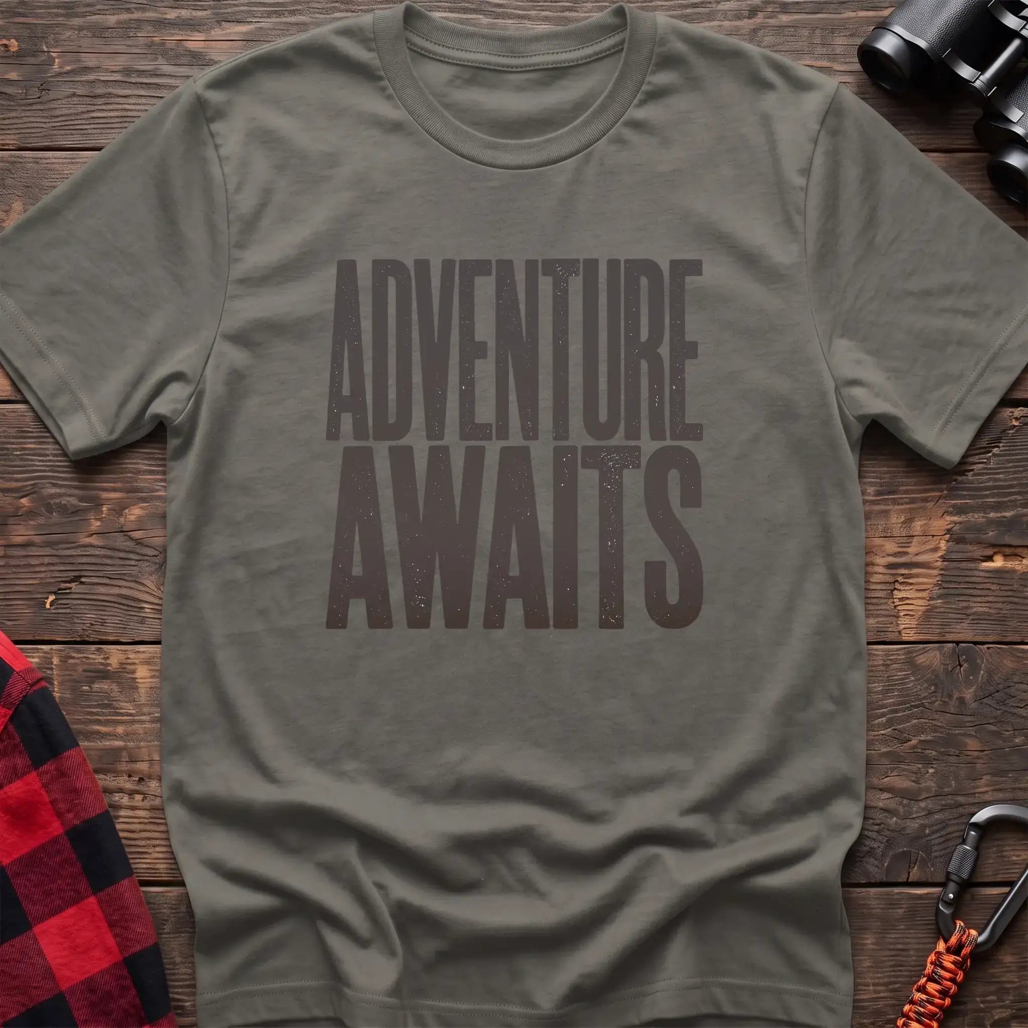 Heather military green t-shirt with large distressed gray text reading Adventure Awaits