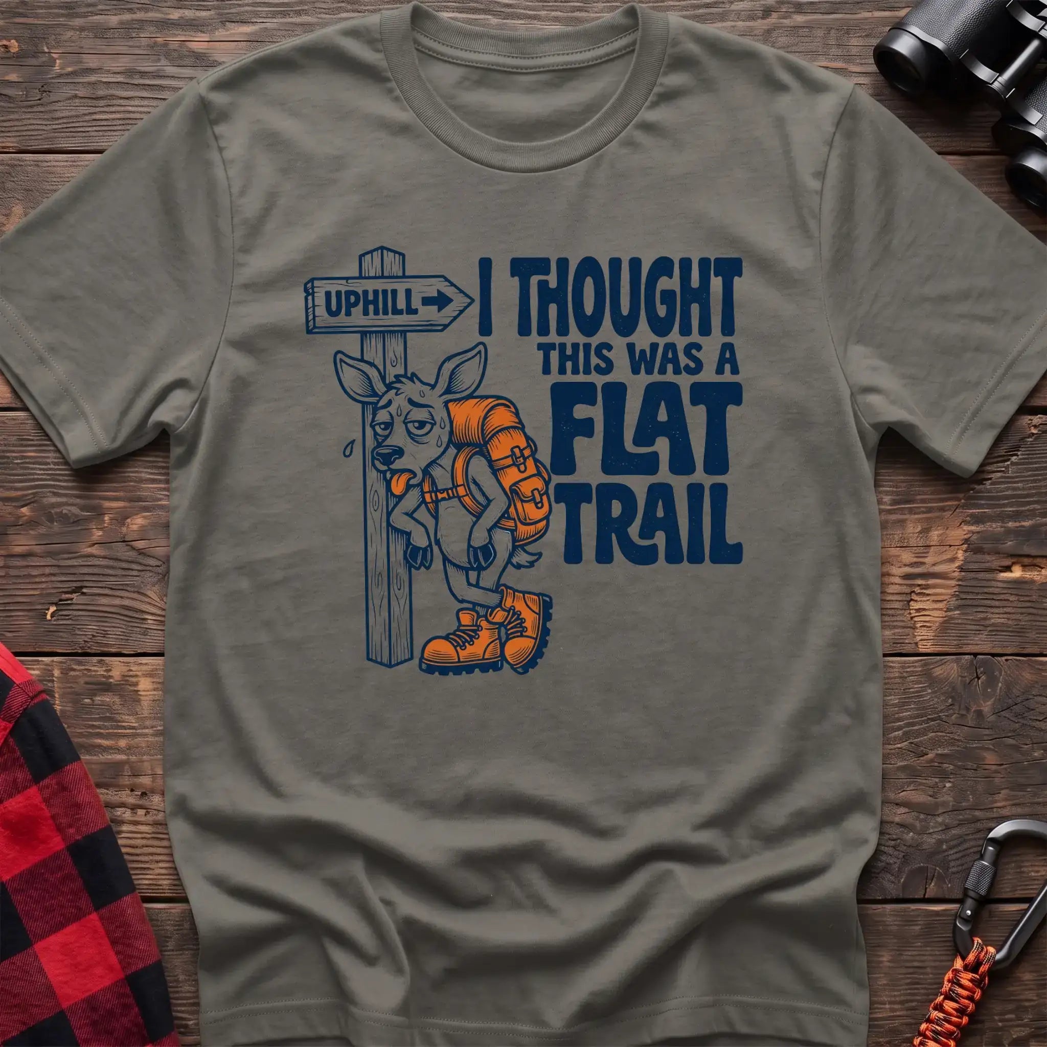 Heather military green t-shirt with exhausted deer leaning on an Uphill trail sign and the text I Thought This Was a Flat Trail