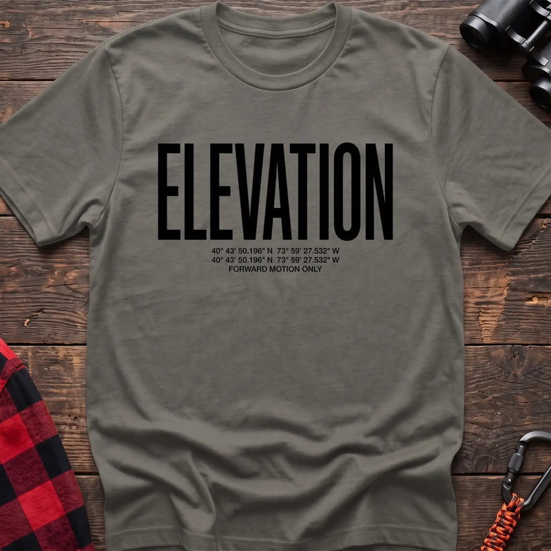 Heather military green t-shirt with large black text reading Elevation and GPS coordinates with Forward Motion Only