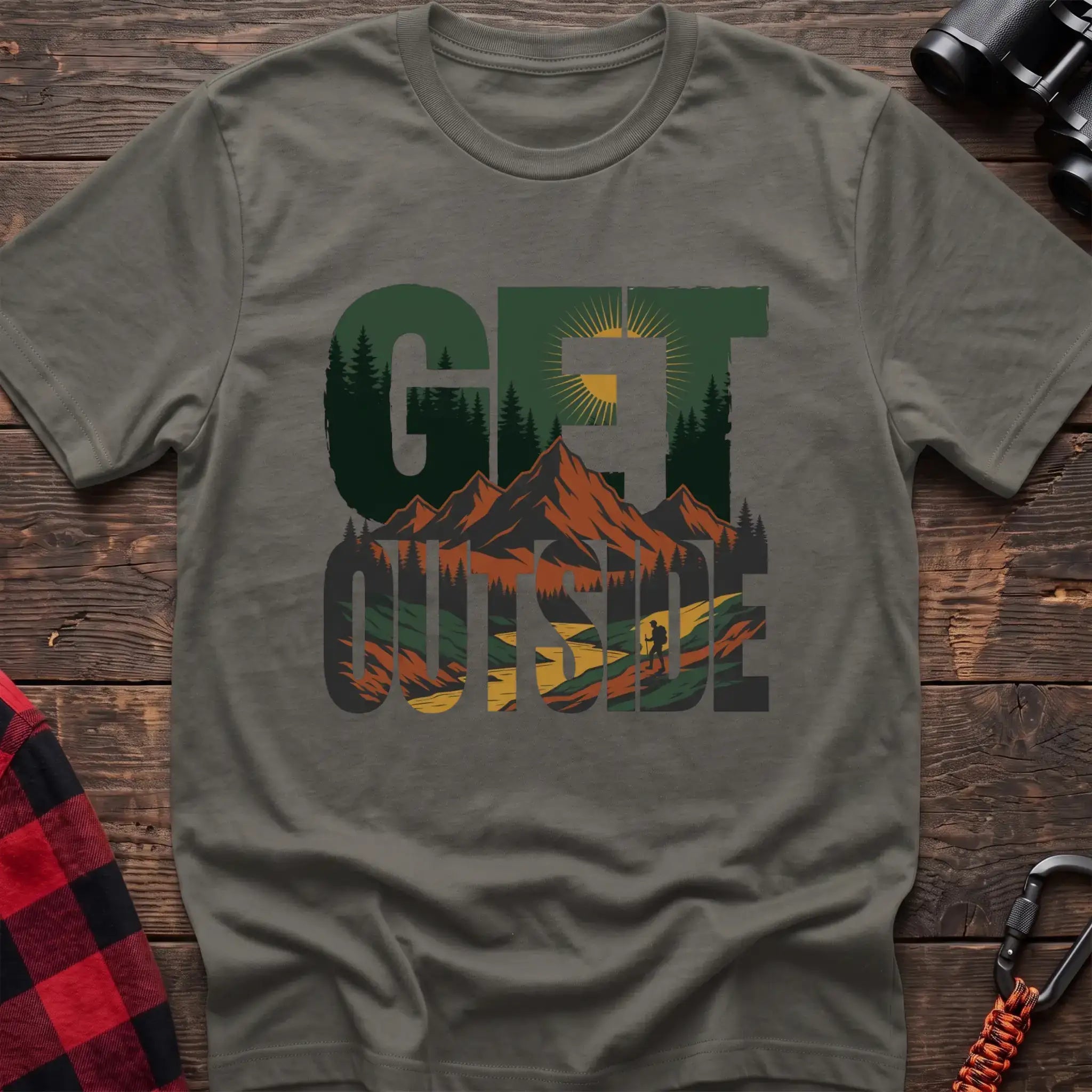 Heather military green t-shirt with layered mountain landscape graphic integrated into the text Get Outside
