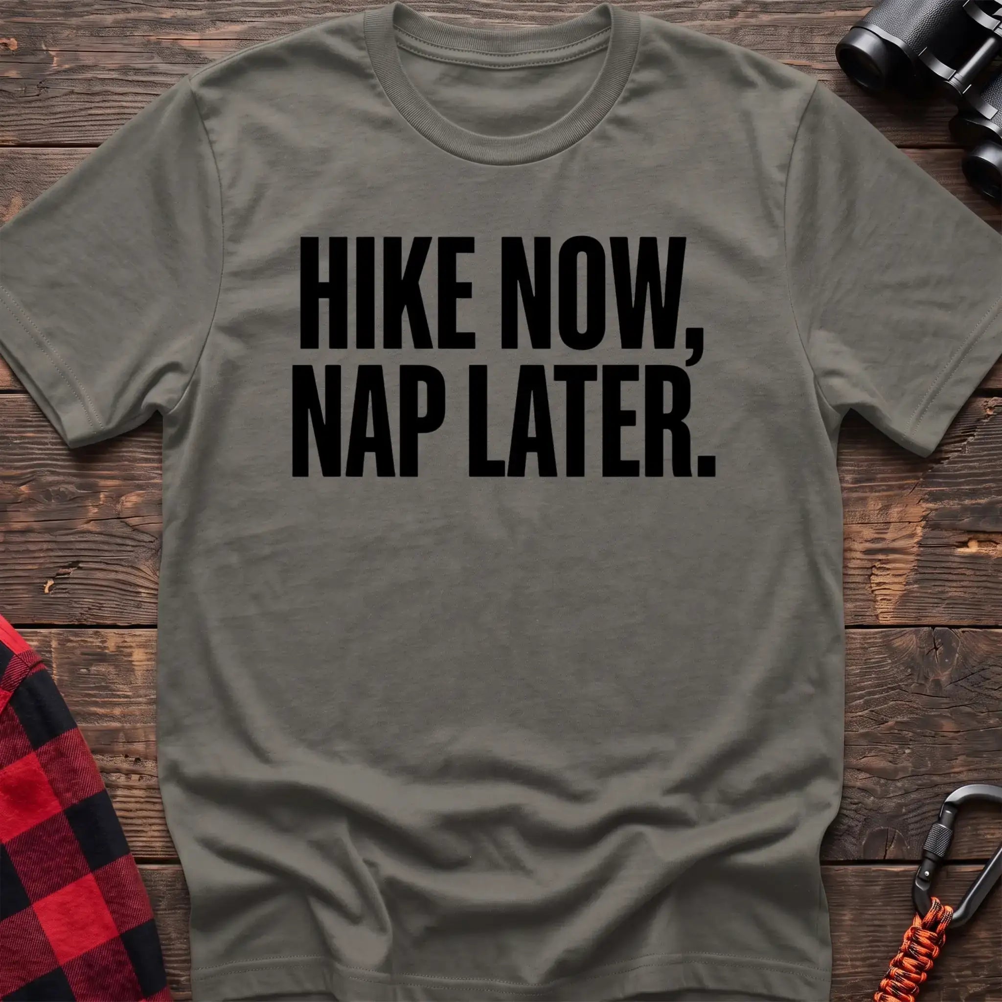 Heather military green t-shirt with bold black text reading Hike Now, Nap Later