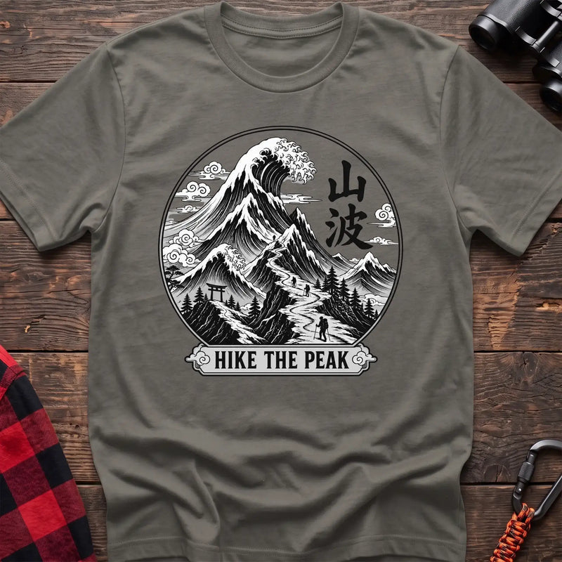 Heather military green t-shirt with circular Japanese-style mountain and wave graphic featuring hikers and the text Hike the Peak