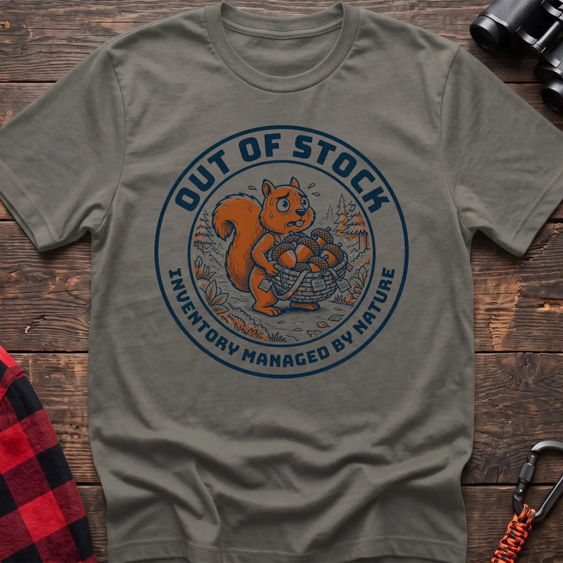 Heather military green t-shirt with circular graphic of a stressed squirrel holding a basket of acorns, reading Out of Stock Inventory Managed by Nature