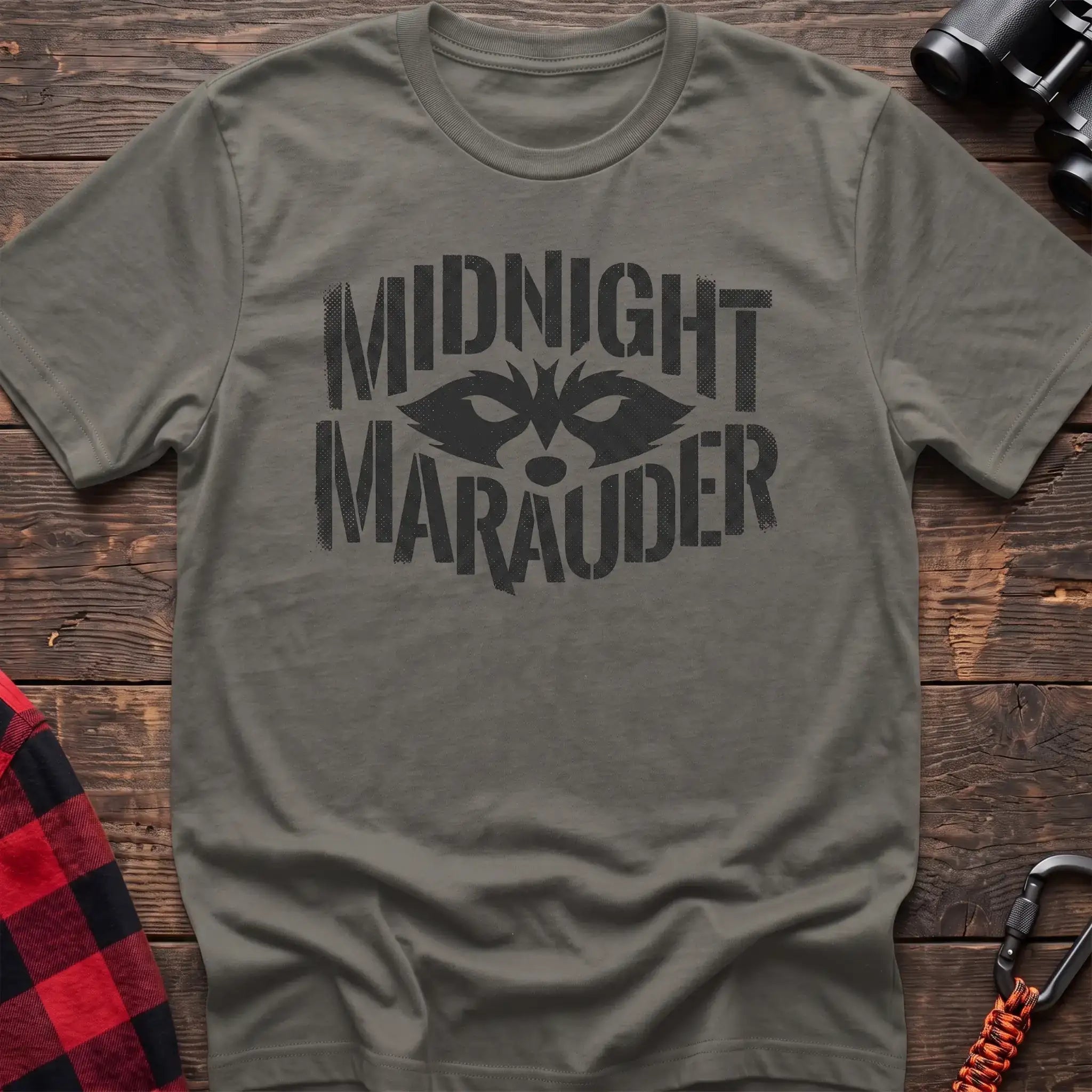 Heather military green t-shirt with dark raccoon face graphic and the text Midnight Marauder