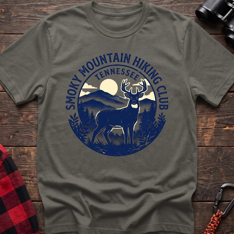 Heather military green t-shirt with circular badge graphic of a deer in the mountains reading Smoky Mountain Hiking Club Tennessee