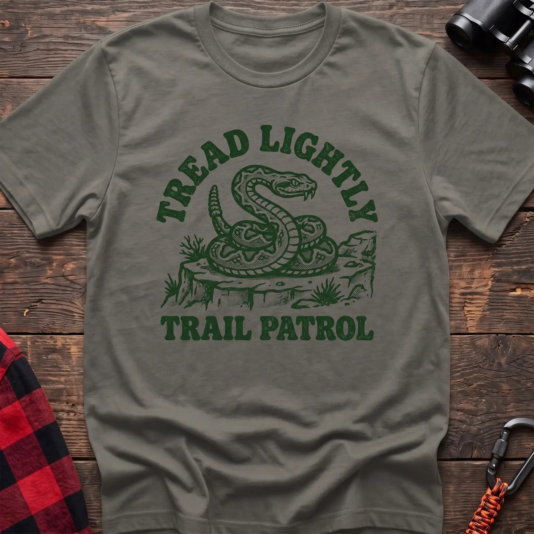 Heather military green t-shirt with dark green rattlesnake illustration and the text Tread Lightly Trail Patrol