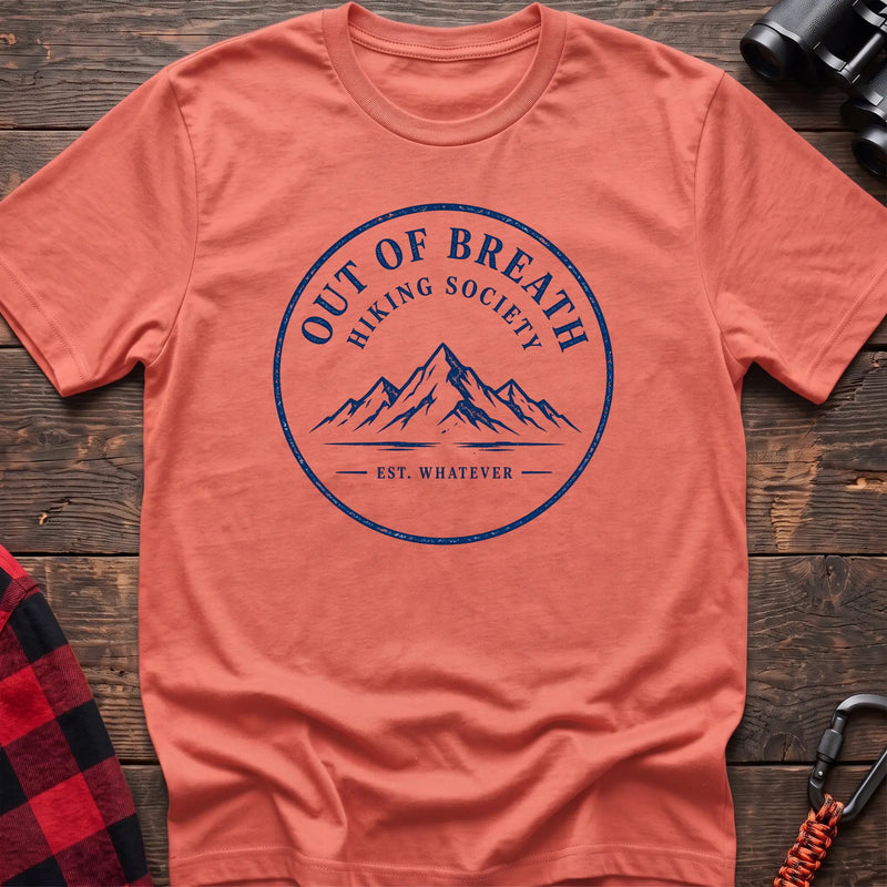 Heather orange hiking t-shirt with Out of Breath Hiking Society mountain badge and Est Whatever text