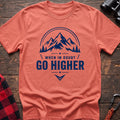 Heather orange cotton hiking t-shirt with navy mountain and pine tree graphic and "When in doubt go higher" quote