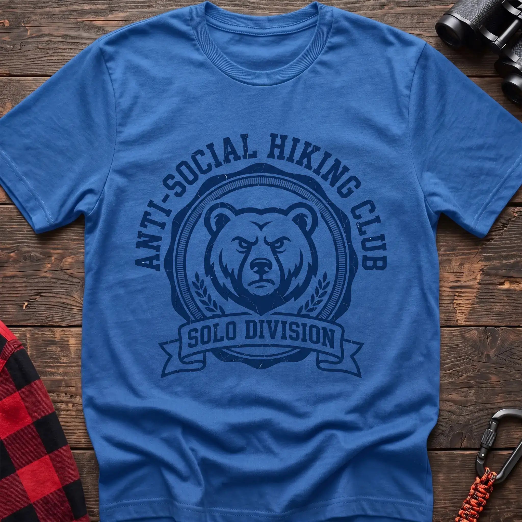 Heather royal t-shirt with circular badge of a serious bear face reading Anti-Social Hiking Club Solo Division