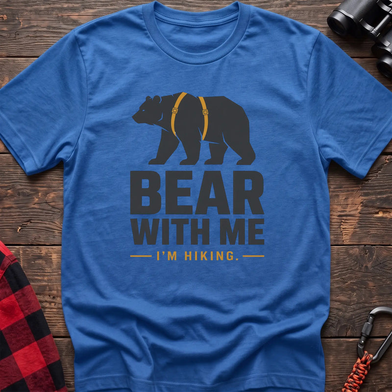 Heather royal cotton hiking t-shirt with black bear wearing a backpack and the text “Bear With Me I’m Hiking”
