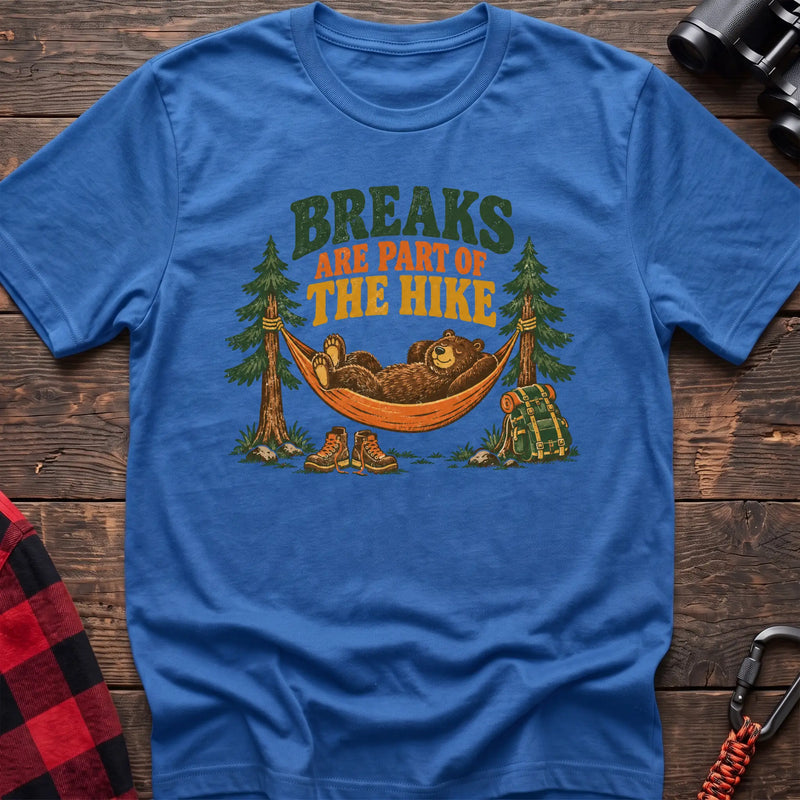 Heather royal cotton t-shirt with a bear in a hammock graphic and Breaks Are Part of the Hike text on rustic wood