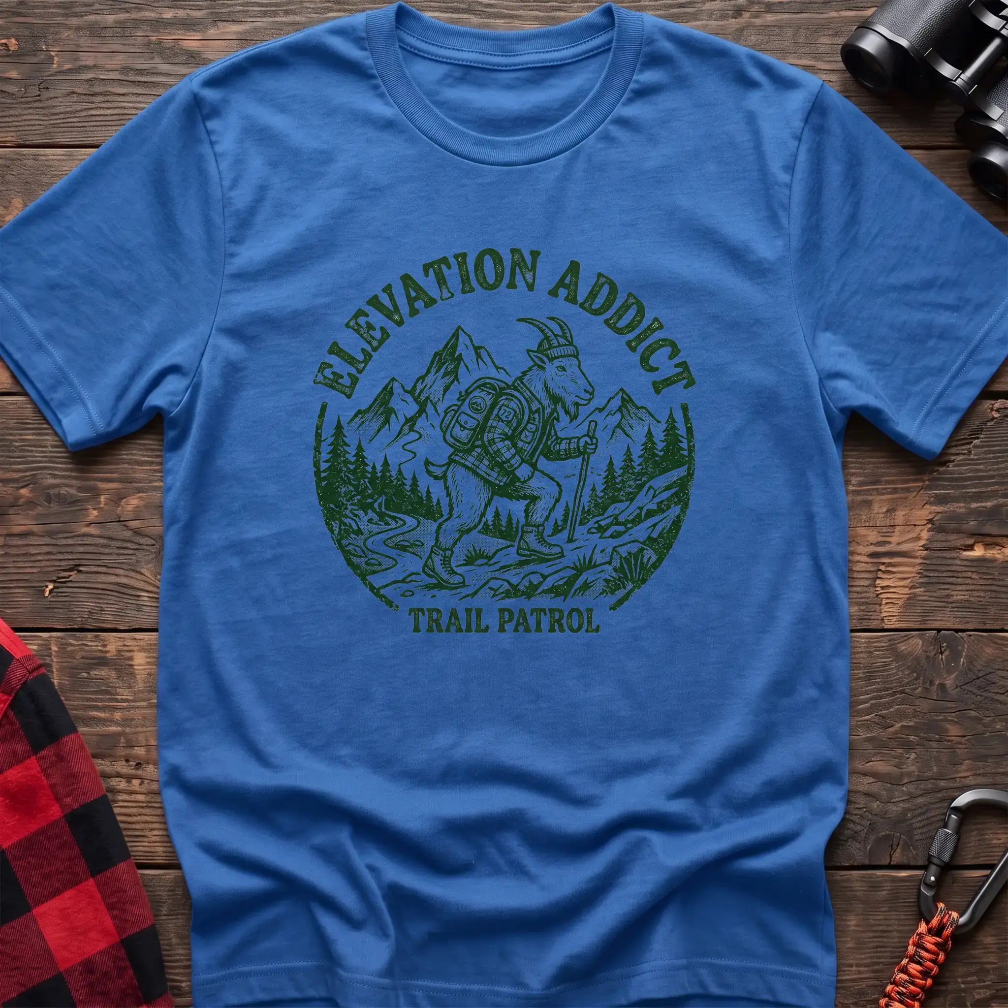 Heather royal t-shirt with circular graphic of a hiking mountain goat and the text Elevation Addict Trail Patrol